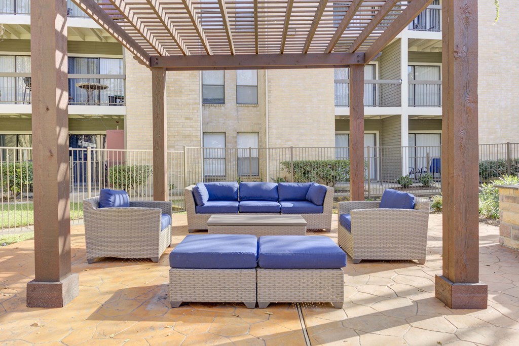 Outdoor seating area at Magnolia Terrace, a pet-friendly apartment community in Far West Houston, Houston, TX.