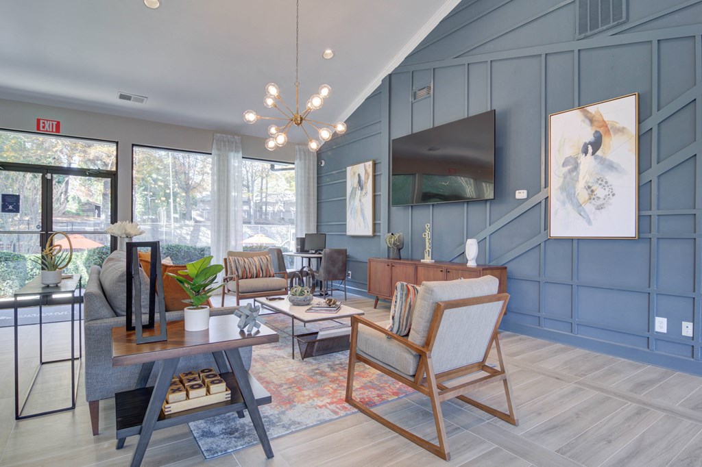 Resident clubhouse at Mirador at Idlewood in Clarkston, Georgia, offering stylish lounge seating, social spaces, and community amenities.