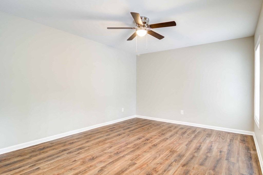 Mirador at Idlewood Apartments in Clarkston Georgia photo of bedroom with hardwood floors