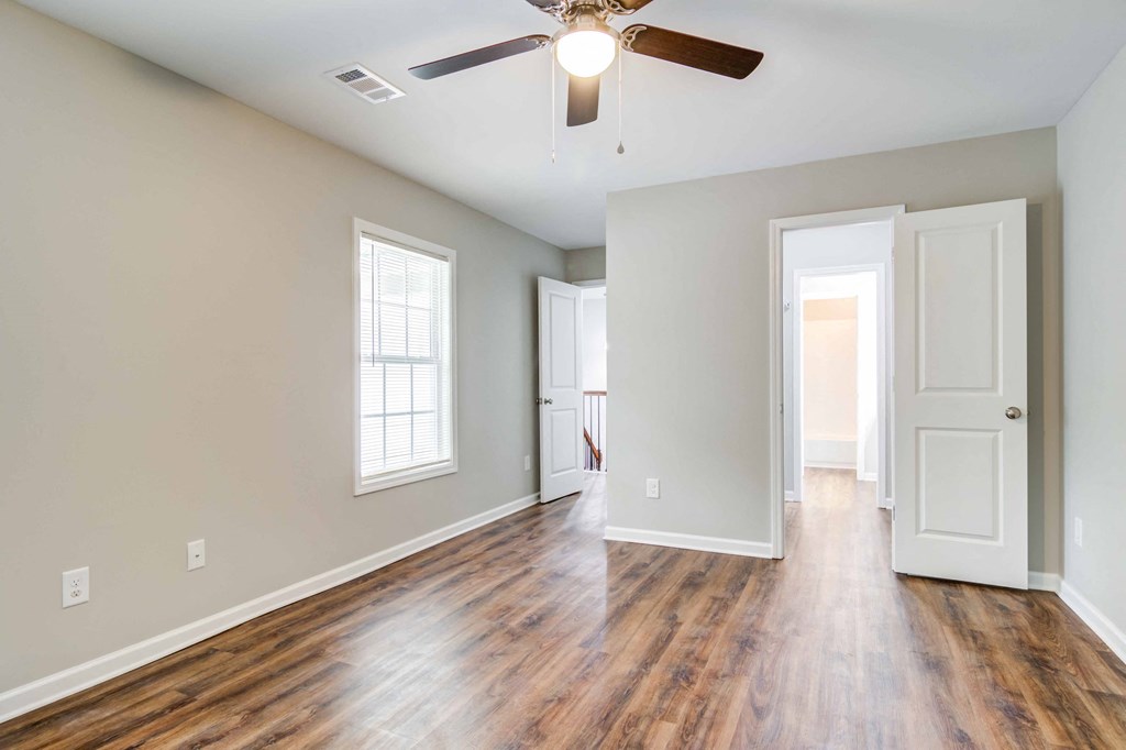 Mirador at Idlewood Apartments in Clarkston Georgia photo of master bedroom with ceiling fan
