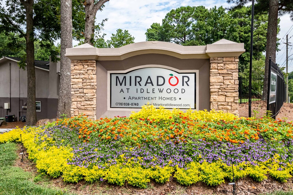 Mirador at Idlewood sign at the entrance of the community in Clarkston, Georgia, surrounded by landscaped greenery.