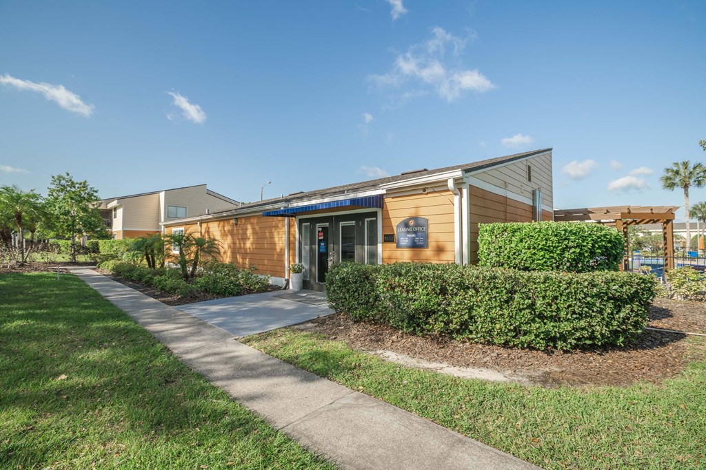 Apartments in Kissimmee for Rent - Mirador at Woodside - Leasing Office with Beautiful Landscaping