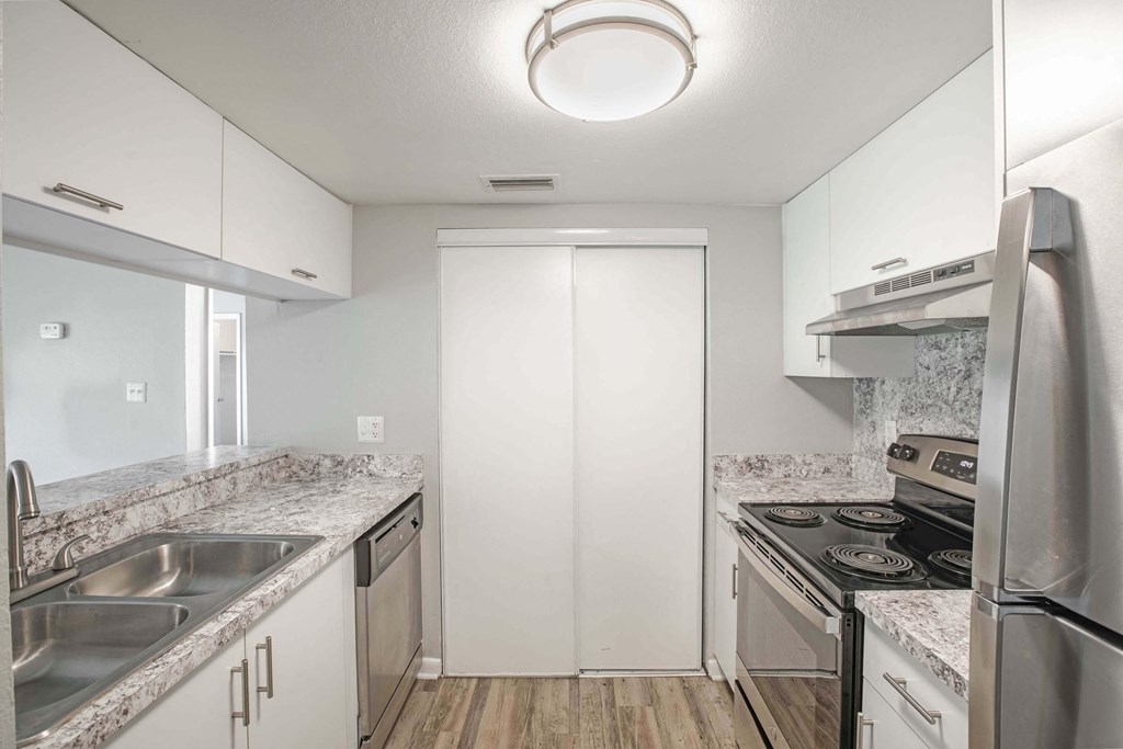 Pet-Friendly Apartments in Kissimmee, FL- Mirador at Woodside - Gourmet Kitchen with Pantry and Cabinet Space
