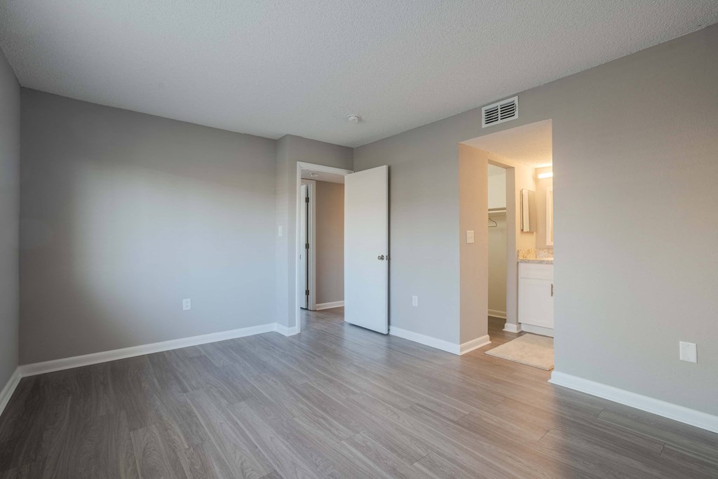 A room with a doorway leading to another room.