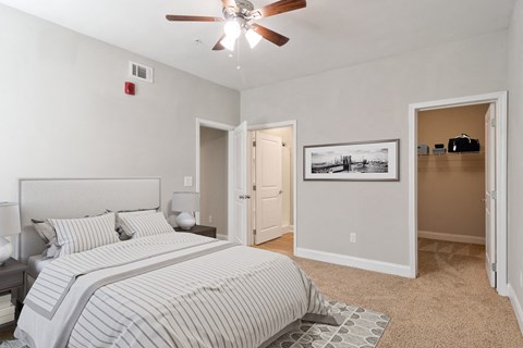 Bedroom at Mirador at Peachtree in Atlanta, Georgia, near Briarcliff, featuring a ceiling fan.