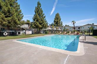 Apartments for Rent Gilroy - Mission Park - Large Pool Surrounded by Lounge Seating