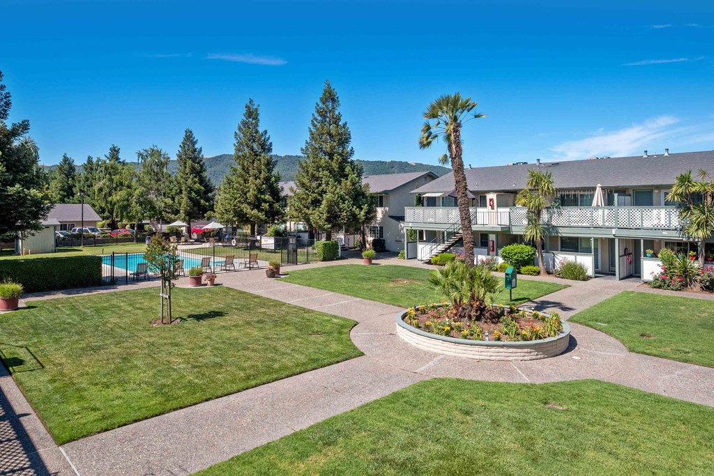 Apartments for Rent Gilroy CA - Mission Park - Spacious Grass Courtyard Next to the Pool
