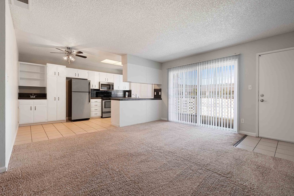 Apartments for Rent in Gilroy - Mission Park - Spacious Living Room with Plush Carpeting and Access to the Kitchen