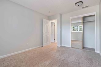 Gilroy Apartments for Rent - Mission Park - Bedroom with a Closet and Plush Carpeting