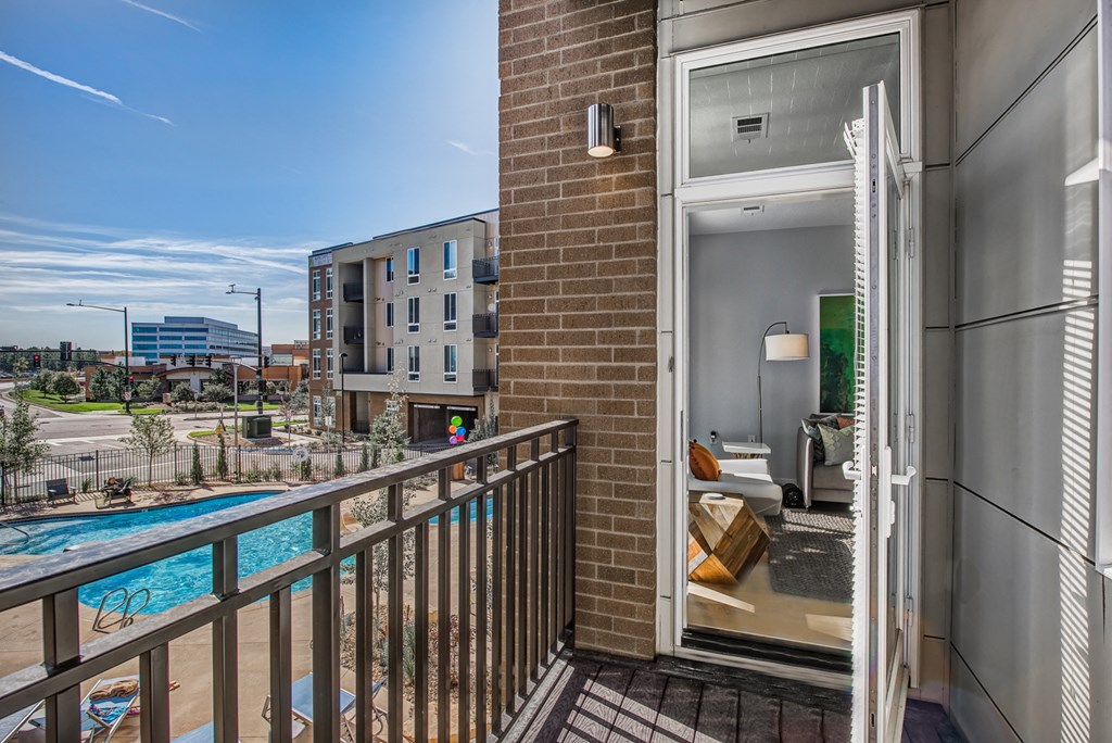 view of pool from balcony at vela on the park apartments