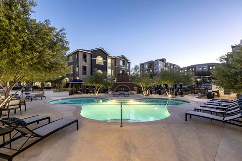 a swimming pool at the preserve at city center apartments