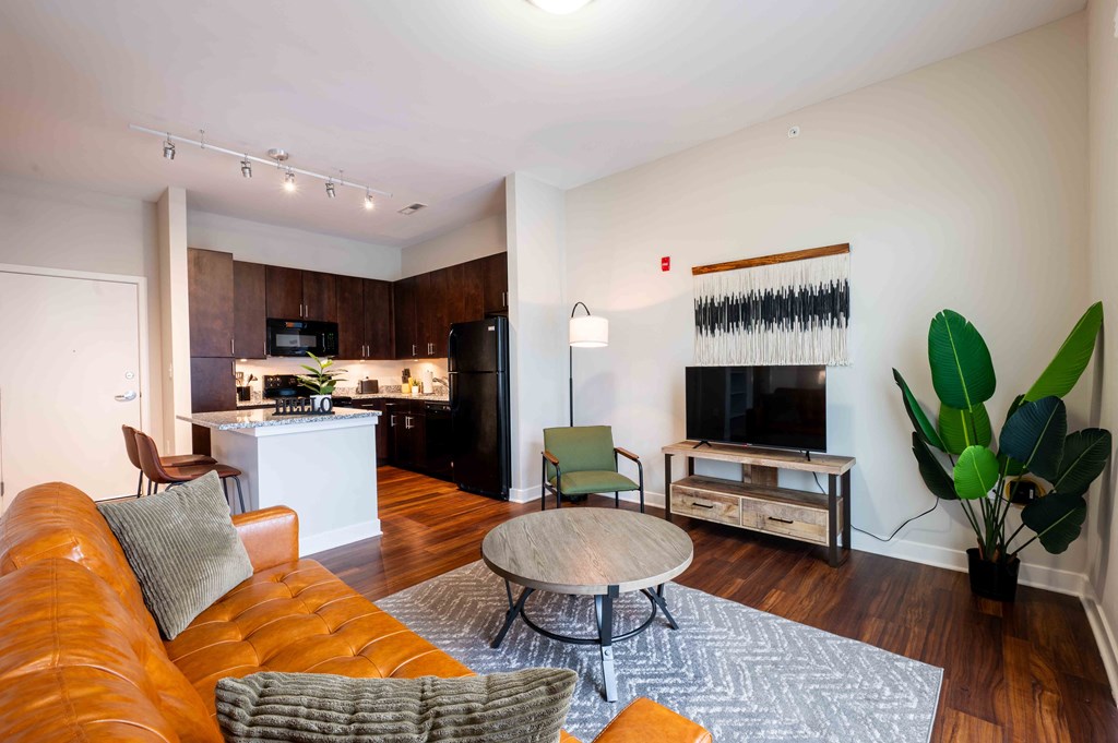 a living room with a couch and a table