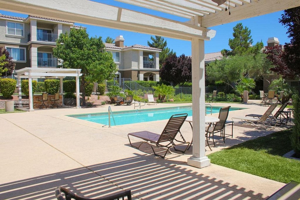 One-BR Apartments In Henderson, NV - Avalon At Seven Hills - Refreshing Swimming Pool With Gazebos, Louge Chairs, Tables, And Extra Seating