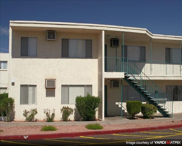 an apartment building with a staircase