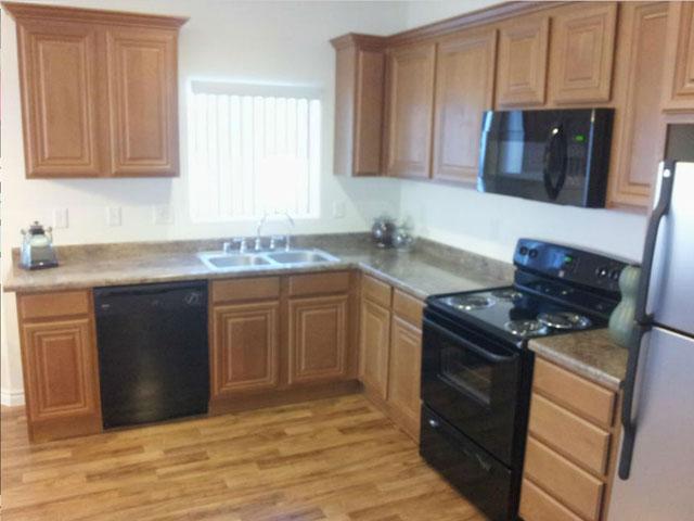 updated kitchen with black appliances