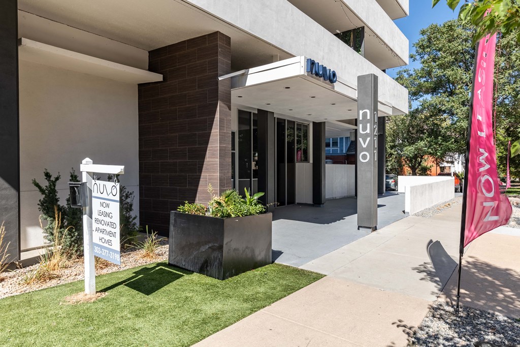 the front of a building with a sign outside of it