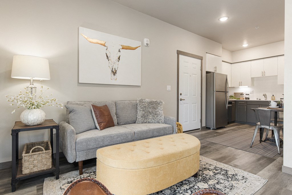 1 bedroom Apartments in Olympia WA - meadowscape - spacious living room with wood-style flooring and access to kitchen,