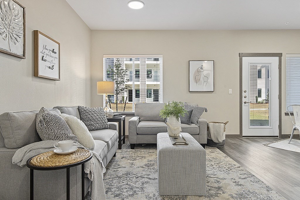 a living room with a couch and a table,