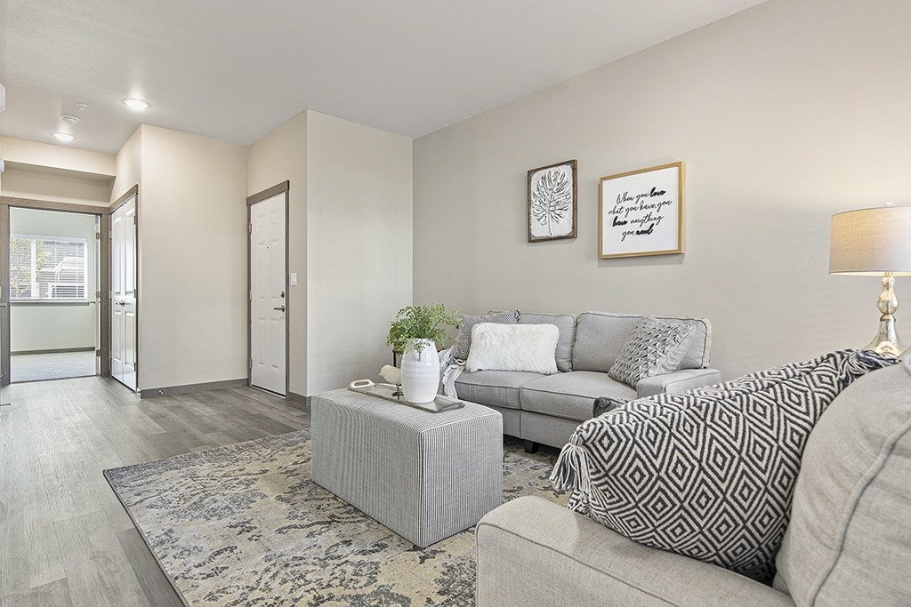 a living room with a couch and a coffee table,