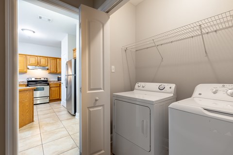 A laundry room with a washer and dryer.
