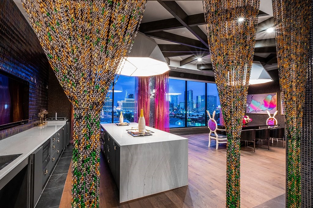 a dining room with a table and a large window