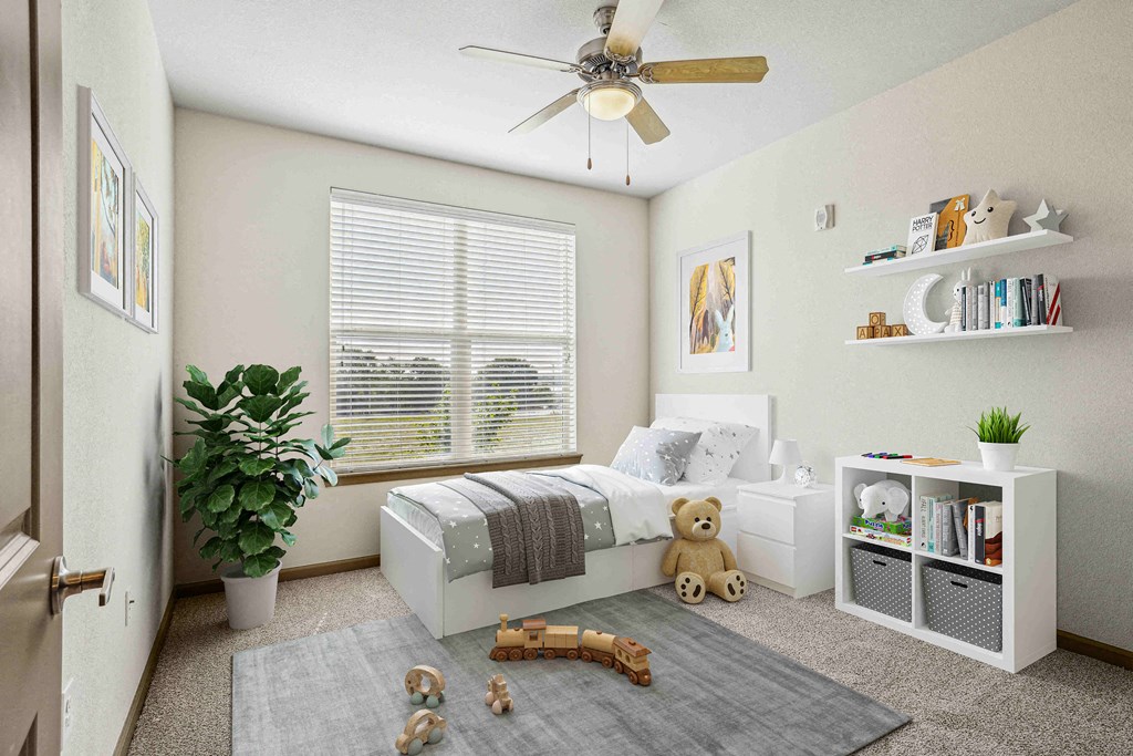 1 & 2-Bedroom Apartments for Rent in Bentonville, AR – Parc at Bentonville – Bedroom with plush carpeting and a ceiling fan