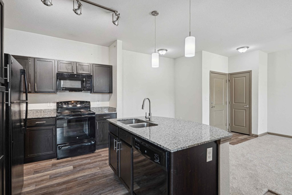 1 & 2-Bedroom Apartments for Rent in Bentonville, AR – Parc at Bentonville – Kitchen with granite countertops