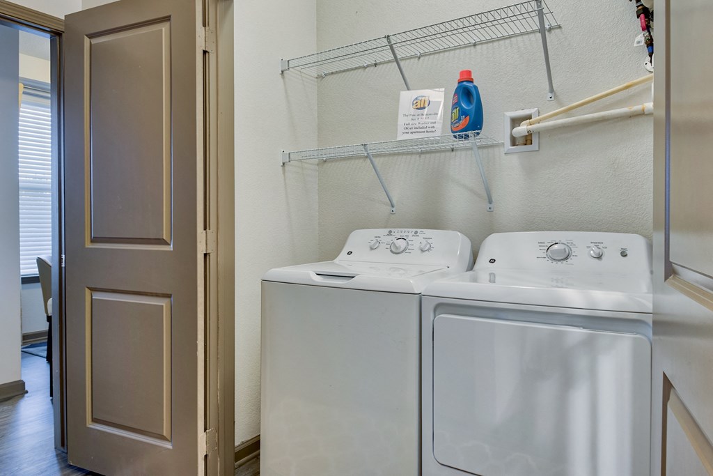 washer and dryer room at Parc at Bentonville Apartments in Bentonville, AR