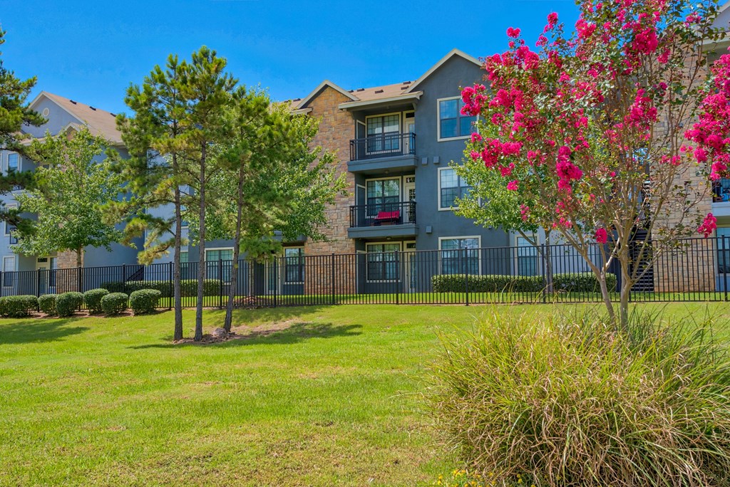 Pet-Friendly Rentals in Maumelle, AR – Parc at Maumelle – exterior photo of community with grass areas
