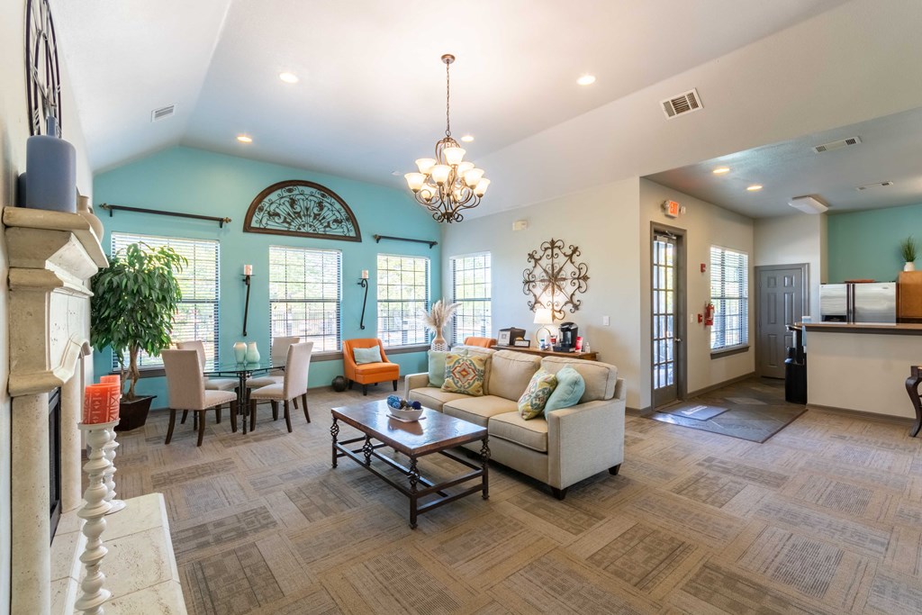 Pet-Friendly Rentals in Maumelle, AR – Parc at Maumelle – Club house with ceiling light and couches and windows