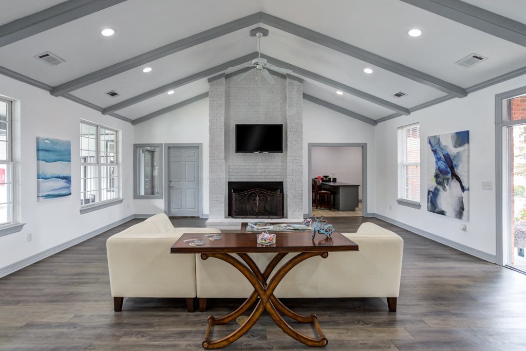 Nashville, TN Apartments - Parc at Metro Center - Clubhouse with vaulting ceilings and TV