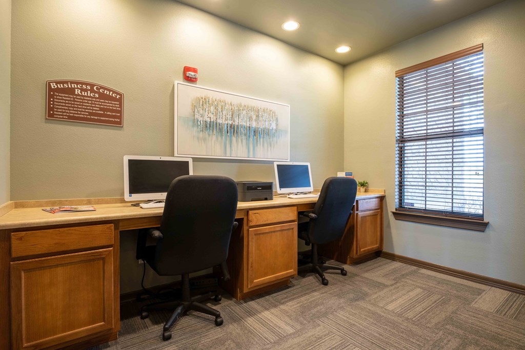 Pet-Friendly Rentals in Rogers, AR – Parc at Rogers – business center with desks and chairs and computers