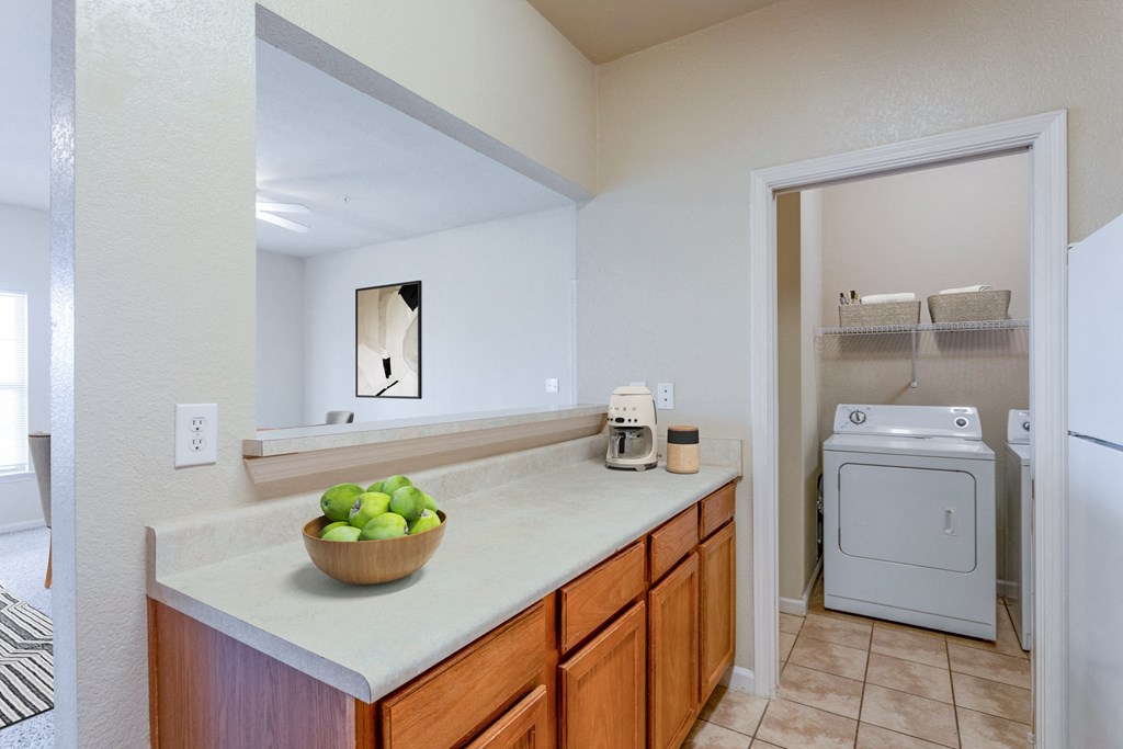 Pet-Friendly Apartments in Clarksville, TN - Parc at Clarksville - kitchen with plenty of counter space and washer and dryer