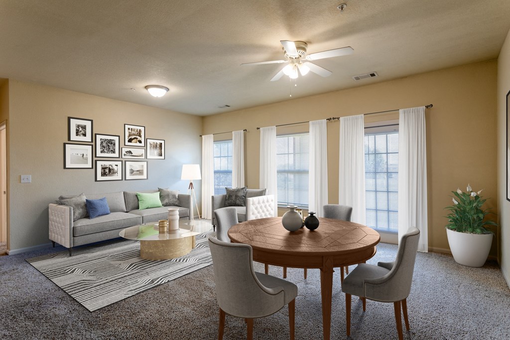 Apartments in Clarksville, TN for Rent - Parc at Clarksville - dining room and living room area and large windows and ceiling fan
