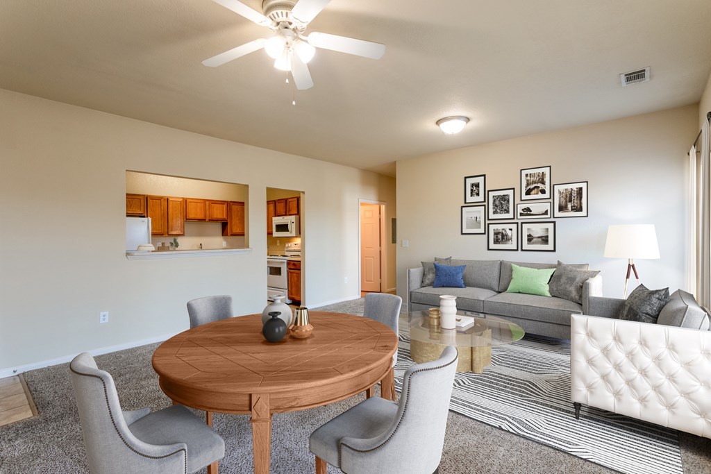 Clarksville, TN Apartments - Parc at Clarksville - living and dining room area with ceiling fan