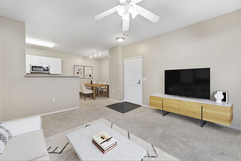 a living room with a couch and a tv