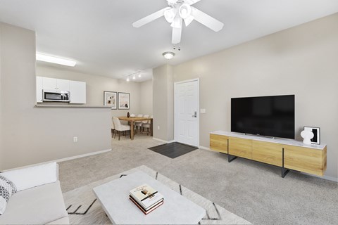 a living room with a couch and a tv