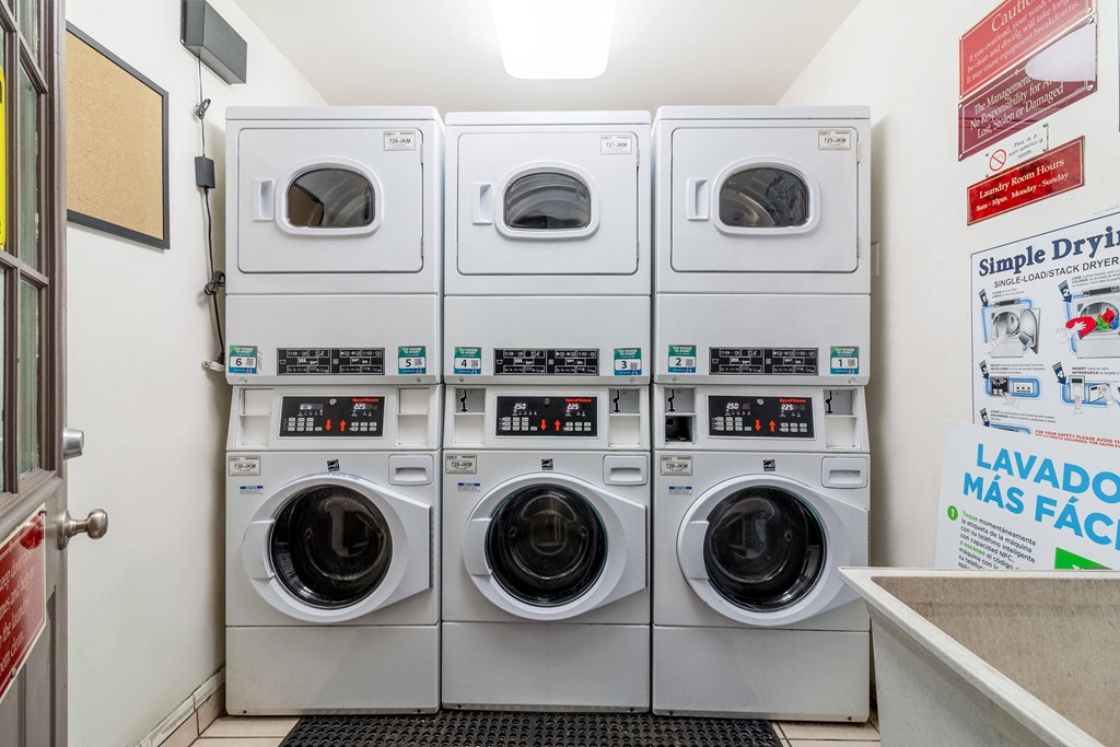 Apartments in Hayward, CA, for Rent - Paseo Gardens - Laundry Room with Sink, Tile Flooring, and Washers and Dryers.