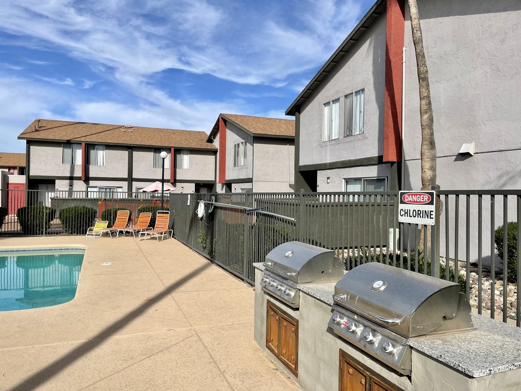 Outdoor grilling stations at Midtown on Seneca, a pet-friendly apartment community near East Central Tucson, Tucson, AZ.