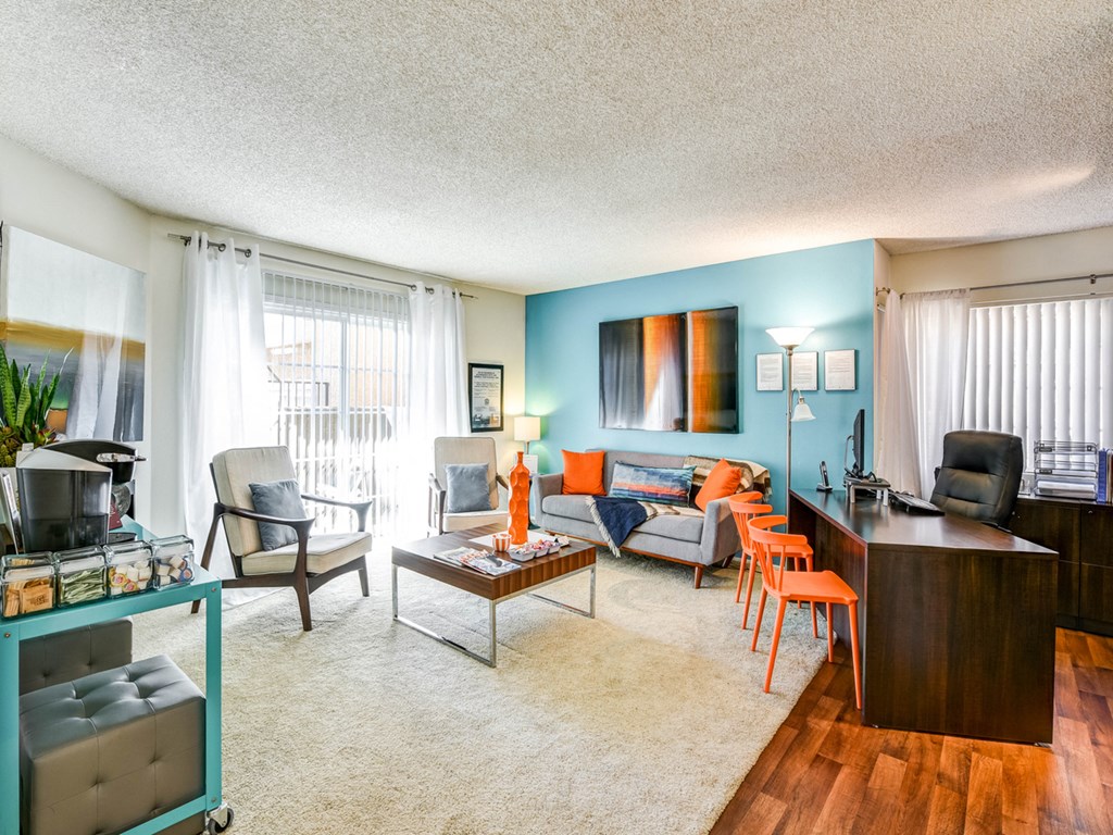 a living room with a couch and a table