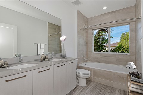 bathroom with modern vanity and finishes in luxury townhome Pompano Beach FL