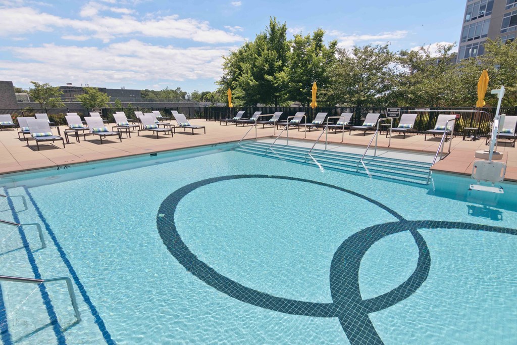 pool with several lounge chairs