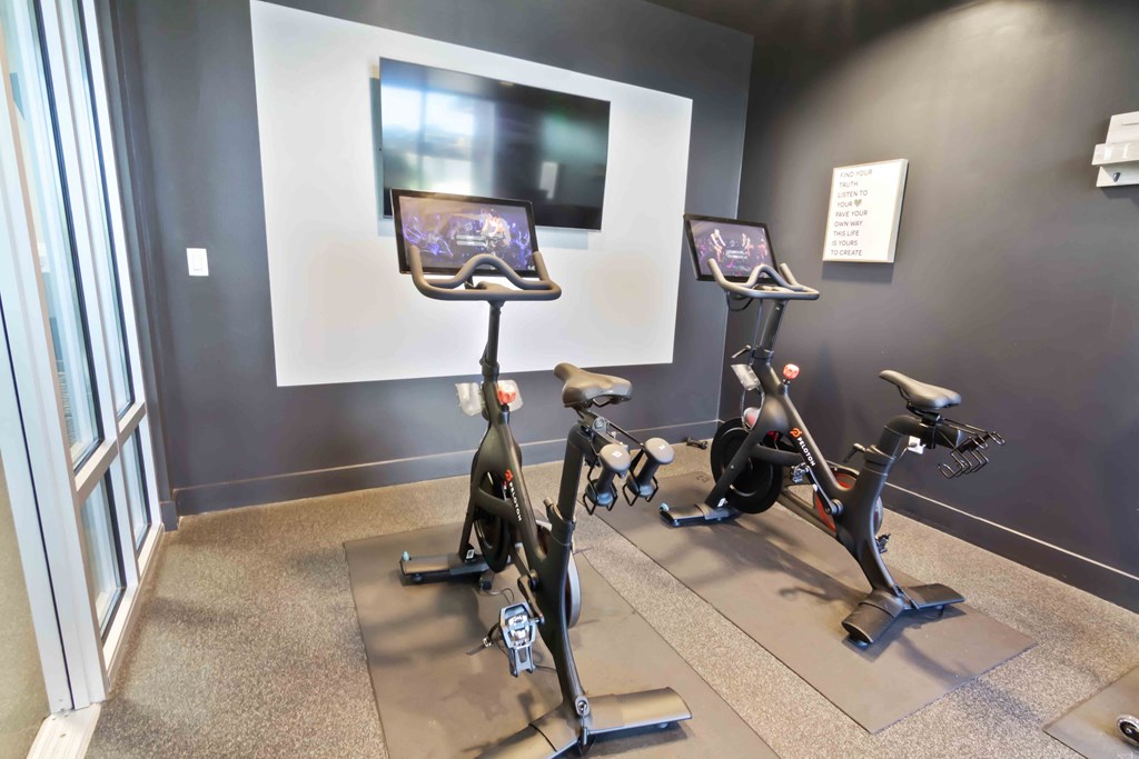 fitness center with peleton exercise bikes