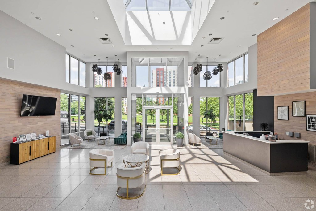 a living room with a large amount of windows