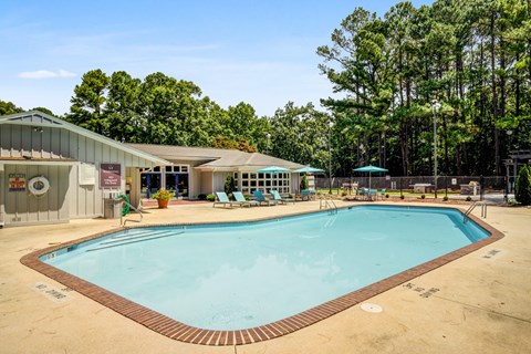 Resort-style pool at Remington Place Apartments in Raleigh, NC with relaxing community amenities