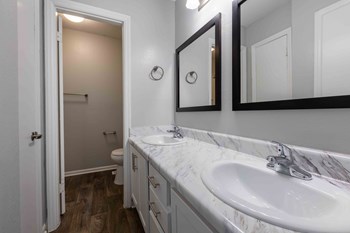 Reserve at Providence Apartments in Charlotte North Carolina photo of bathroom with double vanity - Photo Gallery 15
