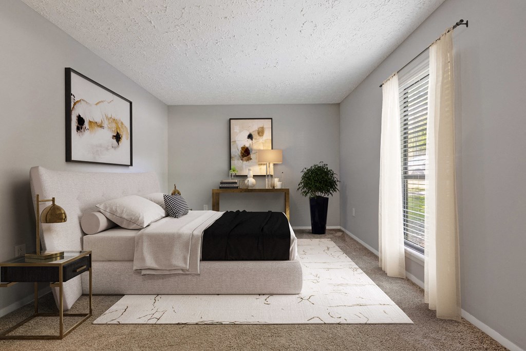 Bedroom with carpet and large window at Reserve at Providence apartments in Charlotte near Matthews, NC