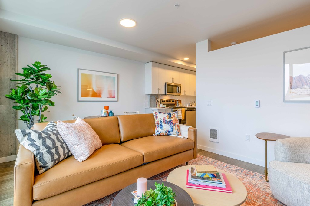 a living room with a couch and a coffee tableat Riverfront Everett, Everett, 98101