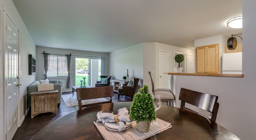 dining area with wood-style flooring
