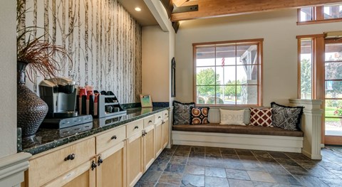 a kitchen with a window and a counter and a sink